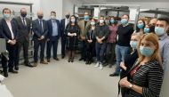 Metropolitan Police (MET) officers, Romanian investigators and owners of stolen books pose in unknown location, picture obtained by Reuters on November 10, 2020. Metropolitan Police/Handout via REUTERS