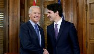 FILE PHOTO: Canada's Prime Minister Justin Trudeau (R) shakes hands with U.S. Vice President Joe Biden during a meeting in Trudeau's office on Parliament Hill in Ottawa, Ontario, Canada, December 9, 2016. REUTERS/Chris Wattie