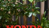 A Honda logo is pictured at a showroom of company’s headquarters in Tokyo on November 6, 2020. / AFP / Philip FONG