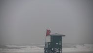 A life guard tower stands in the water covering the entire beach before the arrival of Tropical Storm Eta in Siesta Key, Florida, U.S. November 11, 2020. REUTERS/Ty Wright
