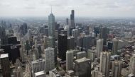 (FILES) In this file photo the downtown Chicago skyline, including the Willis Tower, formerly known as the Sears Tower, are seen in this aerial photograph over Chicago, Illinois, May 30, 2013. The mayor of Chicago, the United States' third biggest city, o