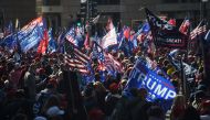Supporters of US President Donald Trump rally in Washington, DC, on November 14, 2020. Supporters are backing Trump's claim that the November 3 election was fraudulent. / AFP / Olivier DOULIERY