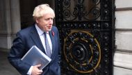 (FILES) In this file photo taken n November 10, 2020, Britain's Prime Minister Boris Johnson arrives back at Downing Street in London after chairing the weekly cabinet meeting held at the nearby Foreign, Commonwealth and Development Office. AFP / Justin T