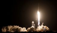 A SpaceX Falcon 9 rocket, with the Crew Dragon capsule, is launched carrying four astronauts on the first operational NASA commercial crew mission at Kennedy Space Center in Cape Canaveral, Florida, U.S. November 15, 2020. REUTERS/Thom Baur