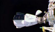 This NASA TV video grab shows Nasa's SpaceX Crew-1 mission aboard the SpaceX Crew Dragon (L) docked to the International Space Station (R) on November 16, 2020. Four astronauts were successfully launched on the SpaceX Crew Dragon 