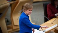 Scotland's First Minister Nicola Sturgeon gestures during the First Minister's Questions session at the Scottish Parliament in Holyrood, Edinburgh on November 12, 2020. / AFP / POOL / Jane Barlow