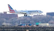 An American Airlines Boeing 737 MAX 8, on a flight from Miami to New York City, comes in for landing at LaGuardia Airport in New York, U.S., March 12, 2019. REUTERS/Shannon Stapleton/File Photo