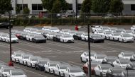 FILE PHOTO: New Tesla electric vehicles are seen in a lot at Tesla's primary vehicle factory after CEO Elon Musk announced he was defying local officials' coronavirus disease (COVID-19) restrictions by reopening the plant in Fremont, California, U.S. May 