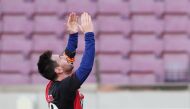 Soccer Football - La Liga Santander - FC Barcelona v Osasuna - Camp Nou, Barcelona, Spain - November 29, 2020 FC Barcelona's Lionel Messi celebrates scoring their fourth goal wearing a Newell's Old Boys shirt in reference to former player Diego Maradona R