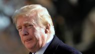 U.S. President Donald Trump walks on the South Lawn of the White House upon his return to Washington from Camp David, U.S., November 29, 2020. REUTERS/Yuri Gripas

