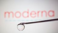 FILE PHOTO: Moderna's logo is reflected in a drop on a syringe needle in this illustration taken November 9, 2020. REUTERS/Dado Ruvic/Illustration/File Photo
