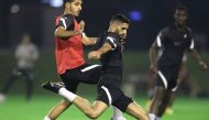 Qatar players in action during a training session.