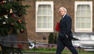 Britain's Prime Minister Boris Johnson arrives back at 10 Downing Street in London on December 15, 2020 after chairing the weekly cabinet meeting held at the nearby Foreign, Commonwealth and Development Office. AFP / Daniel Leal-Olivas 