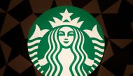 A Starbucks logo is pictured on the door of the Green Apron Delivery Service at the Empire State Building in the Manhattan borough of New York, U.S. June 1, 2016. REUTERS/Carlo Allegri/File Photo