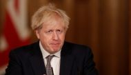 Britain's Prime Minister Boris Johnson speaks during a news conference about the ongoing situation with the coronavirus disease (COVID-19) pandemic, inside 10 Downing Street, in London, Britain, December 16, 2020. Matt Dunham/Pool via REUTERS