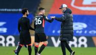 Liverpool manager Juergen Klopp and Liverpool's Andrew Robertson celebrate after the match. REUTERS/Adam Davy