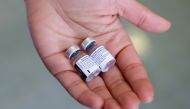 Walgreens Pharmacist Jessica Sahni holds the Pfizer-BioNTech coronavirus disease (COVID-19) vaccine at The New Jewish Home in the Manhattan borough of New York City, New York, U.S., December 21, 2020. REUTERS/Yuki Iwamura