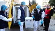 Medical workers receive the first shipment of Pfizer-BioNTech coronavirus disease (COVID-19) vaccines at The Institute of Virology, Vaccines and Sera 