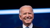 FILE PHOTO: US President-Elect Joe Biden delivers remarks, before the holiday, at The Queen in Wilmington, Delaware.  AFP / Alex Edelman