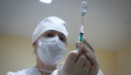 A nurse prepares dose of the Sputnik V (Gam-COVID-Vac) Covid-19 vaccine for a patient at a clinic in Moscow on December 30, 2020, as the country started its vaccination campaign for people aged 60 and over, to fight against the spread of the novel coronav