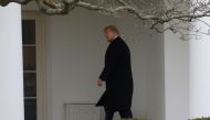 US President Donald Trump walks to the Oval Office after returning from Mar-A-Lago to the White House in Washington, December 31, 2020. (REUTERS/Leah Millis)