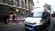 A prison van arrives at the Old Bailey, the Central Criminal Court as members of the media wait for WikiLeaks founder Julian Assange's arrival, in London, Britain, January 4, 2021. Reuters/Hannah McKay