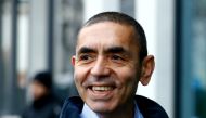 CEO and co-founder of BioNTech, Ugur Sahin, answers journalists' questions after the European Medicines Agency (EMA) approved its COVID-19 vaccine, at the company headquarters in Mainz, Germany December 22, 2020. Reuters/Ralph Orlowski/File Photo