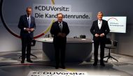 File photo: The three candidates for the chairmanship of Germany's Christian Democratic Union (CDU) party, from left to right, Friedrich Merz, Armin Laschet and Norbert Roettgen, pose at the end of a debate at party headquarters in Berlin, Germany, Januar