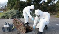Firefighters from the Marins-Pompiers of Marseille (Marseille Naval Fire Battalion) take samples in Marseille sewage water to detect the concentration of coronavirus traces and the presence of the new UK variant of the virus in Marseille, France, January 