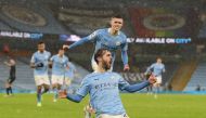 Soccer Football - Premier League - Manchester City v Aston Villa - Etihad Stadium, Manchester, Britain - January 20, 2021 Manchester City's Bernardo Silva celebrates scoring their first goal Pool via REUTERS/Martin Rickett 