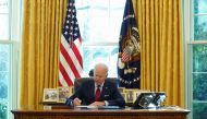 U.S. President Joe Biden signs executive orders strengthening access to affordable healthcare at the White House in Washington, U.S., January 28, 2021. REUTERS/Kevin Lamarque
