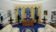 U.S. President Joe Biden prepares to sign executive orders on immigration at the White House in Washington, U.S., February 2, 2021. REUTERS/Tom Brenner
