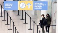 Passengers arrive at Toronto's Pearson airport after mandatory coronavirus disease (COVID-19) testing took effect for international arrivals in Mississauga, Ontario, Canada February 1, 2021. REUTERS/Carlos Osorio/File Photo