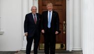 FILE PHOTO: U.S. President-elect Donald Trump stands with former New York City Mayor Rudolph Giuliani before their meeting at Trump National Golf Club in Bedminster, New Jersey, U.S., November 20, 2016. REUTERS/Mike Segar
