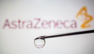 FILE PHOTO: AstraZeneca's logo is reflected in a drop on a syringe needle in this illustration taken November 9, 2020. REUTERS/Dado Ruvic/Illustration/File Photo
