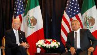 FILE PHOTO: Then-U.S. vice president Joe Biden (L) with Andres Manuel Lopez Obrador, then candidate for president of Mexico, in Mexico City, March 5, 2012. REUTERS/Tomas Bravo/File Photo

