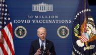 U.S. President Joe Biden delivers remarks as he commemorates the 50 millionth coronavirus disease (COVID-19) vaccination with a number of vaccine recipients in the South Court Auditorium at the White House in Washington, U.S., February 25, 2021. REUTERS/J