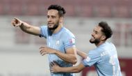 Al Wakrah's Mohamed Benyettou celebrate after scoring against Al Gharafa yesterday.