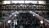 People walk after disembarking from a train at Luz station during the outbreak of the coronavirus disease (COVID-19) in Sao Paulo, Brazil March 23, 2021. REUTERS/Carla Carniel
