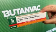 Dimas Tadeu Covas, director of Brazil's Butantan biomedical institute, shows a box of Butanvac, a potential vaccine against the coronavirus disease (COVID-19), in Sao Paulo, Brazil March 26, 2021. REUTERS/Leonardo Benassatto NO RESALES. NO ARCHIVES