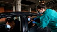 A man receives an AstraZeneca vaccine against the coronavirus disease (COVID-19) in Huelva, Spain March 24, 2021. REUTERS/Marcelo del Pozo
