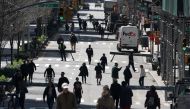 FILE PHOTO: People walk on Park Avenue, which was closed to vehicular traffic, during the outbreak of coronavirus disease (COVID-19), in the Manhattan borough of New York City, New York, U.S., March 27, 2020. REUTERS/Carlo Allegri