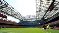 AC Milan's Hakan Calhanoglu takes a corner REUTERS/Daniele Mascolo
