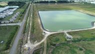 A reservoir of a defunct phosphate plant south of Tampa, where a leak at a waste water reservoir forced the evacuation of hundreds of homes and threatened to flood the area and Tampa Bay with polluted water, is seen in an aerial photograph taken in Piney 