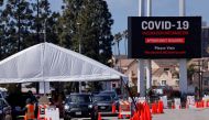 FILE PHOTO: A large vaccination site is shown as people with preexisting health conditions are granted access to a vaccination during the outbreak of the coronavirus disease (COVID-19) in Inglewood, California, U.S., March 15, 2021. REUTERS/Mike Blake/Fil