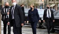 German Chancellor Angela Merkel arrives at Gendarmenmarkt square for a memorial ceremony for the victims of coronavirus disease (COVID-19) pandemic, in Berlin, Germany April 18, 2021. REUTERS/Christian Mang
