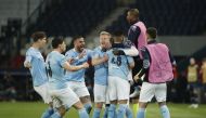 Manchester City's Riyad Mahrez celebrates scoring their second goal with teammates REUTERS/Benoit Tessier