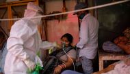 A woman with a breathing problem receives oxygen support for free at a Gurudwara (Sikh temple), amidst the spread of coronavirus disease (COVID-19), in Ghaziabad, India, April 30, 2021. REUTERS/Adnan Abidi