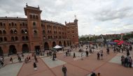 People stand outside Las Ventas bullring ahead of the first bullfight since the start of the coronavirus disease (COVID-19) pandemic, in Madrid, Spain, May 2, 2021. REUTERS/Susana Vera
