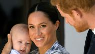 Britain's Prince Harry and his wife Meghan, Duchess of Sussex holding their son Archie, meet Archbishop Desmond Tutu (not pictured) at the Desmond & Leah Tutu Legacy Foundation in Cape Town, South Africa, September 25, 2019. REUTERS/Toby Melville/File Pho